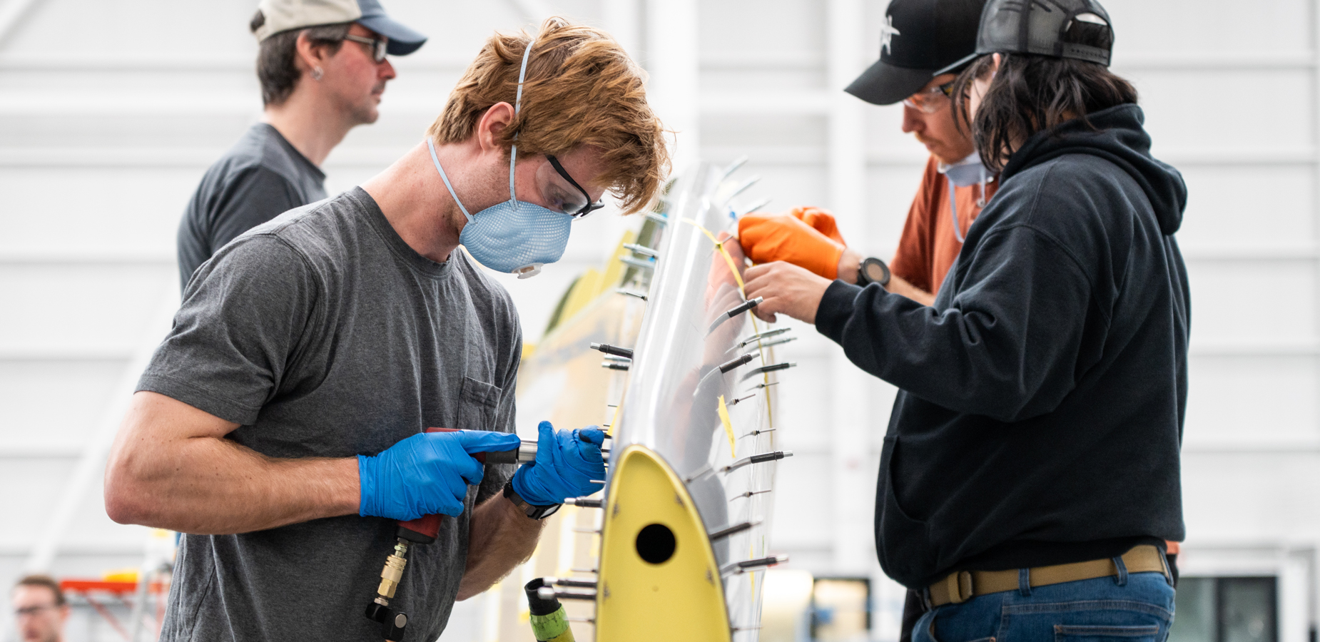 employees performing a stress test on a wing at Beta Technologies